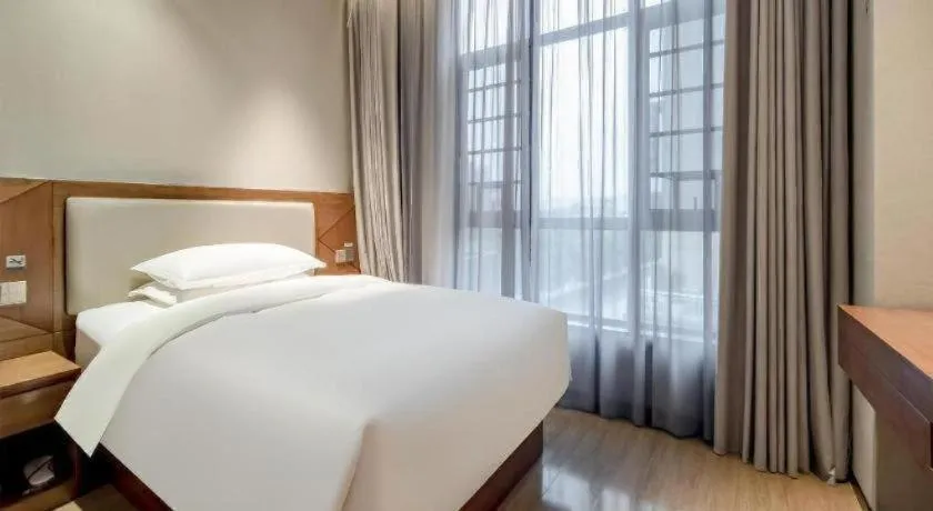 Bed in Borrman Hotel Baise High-speed Railway Station Hengning Plaza