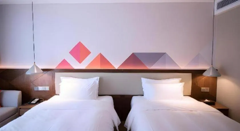 Bed in Borrman Hotel Baise High-speed Railway Station Hengning Plaza