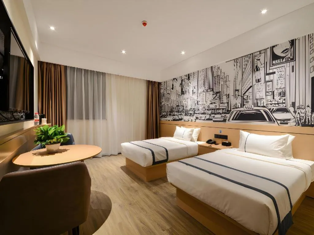 Bed in City Comfort Inn Jingzhou Fantawild Shashi Middle School