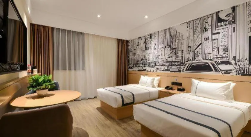 Bed in City Comfort Inn Jingzhou Fantawild Shashi Middle School