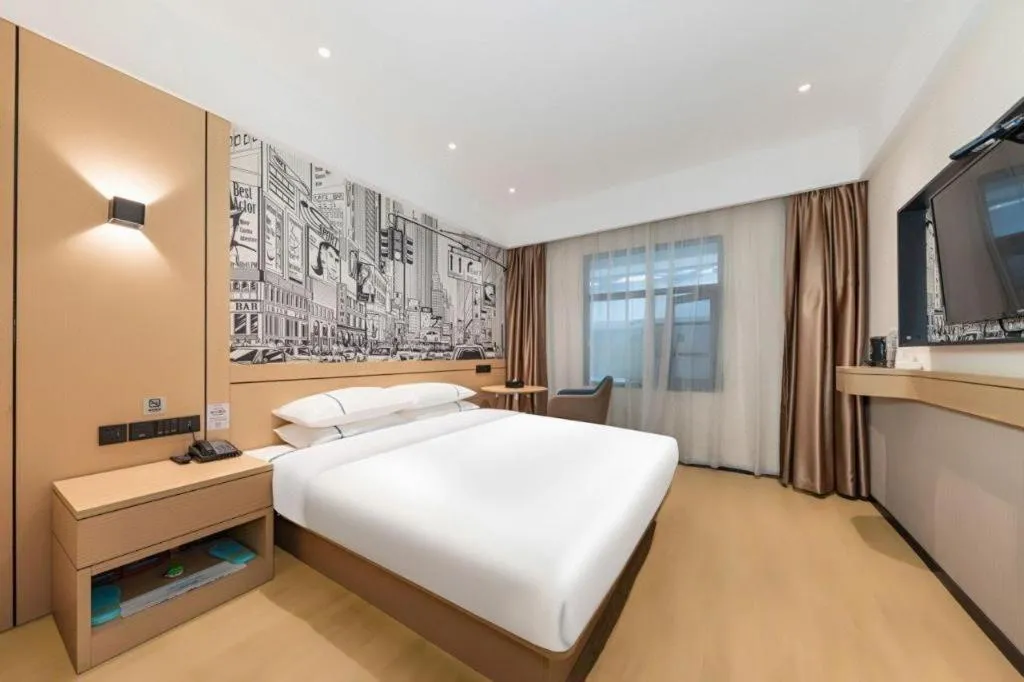 Bed in City Comfort Inn Jingzhou Fantawild Shashi Middle School