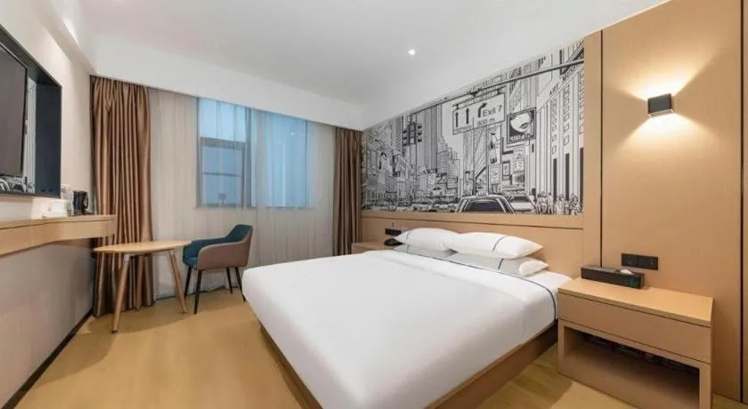 Bed in City Comfort Inn Jingzhou Fantawild Shashi Middle School