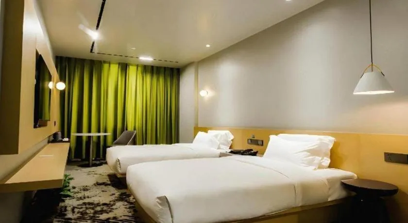 Bed in Borrman Hotel Jining High-tech Huangtun