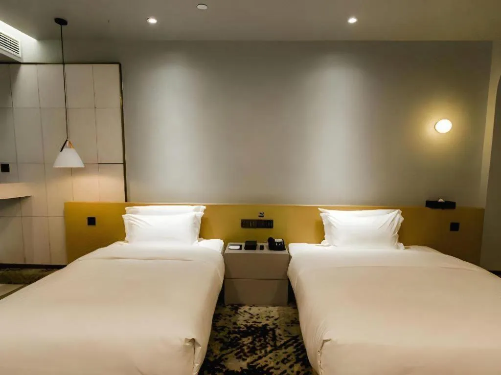 Bed in Borrman Hotel Jining High-tech Huangtun