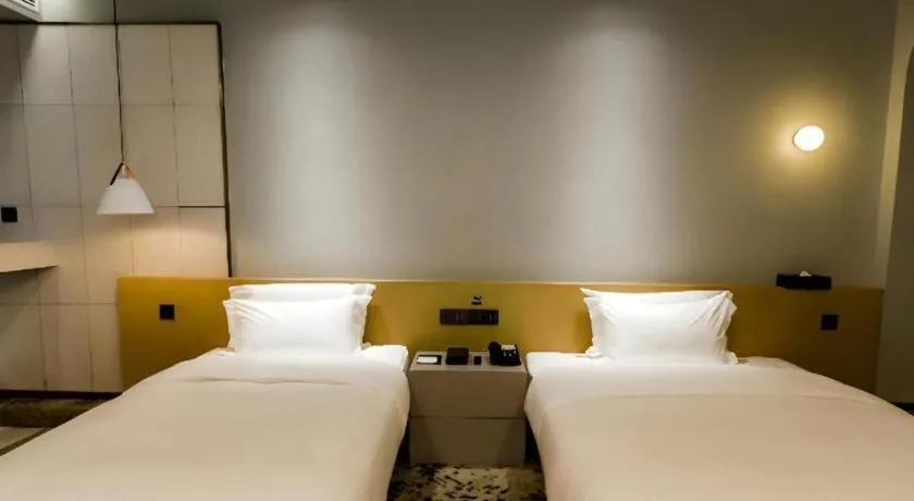 Bed in Borrman Hotel Jining High-tech Huangtun
