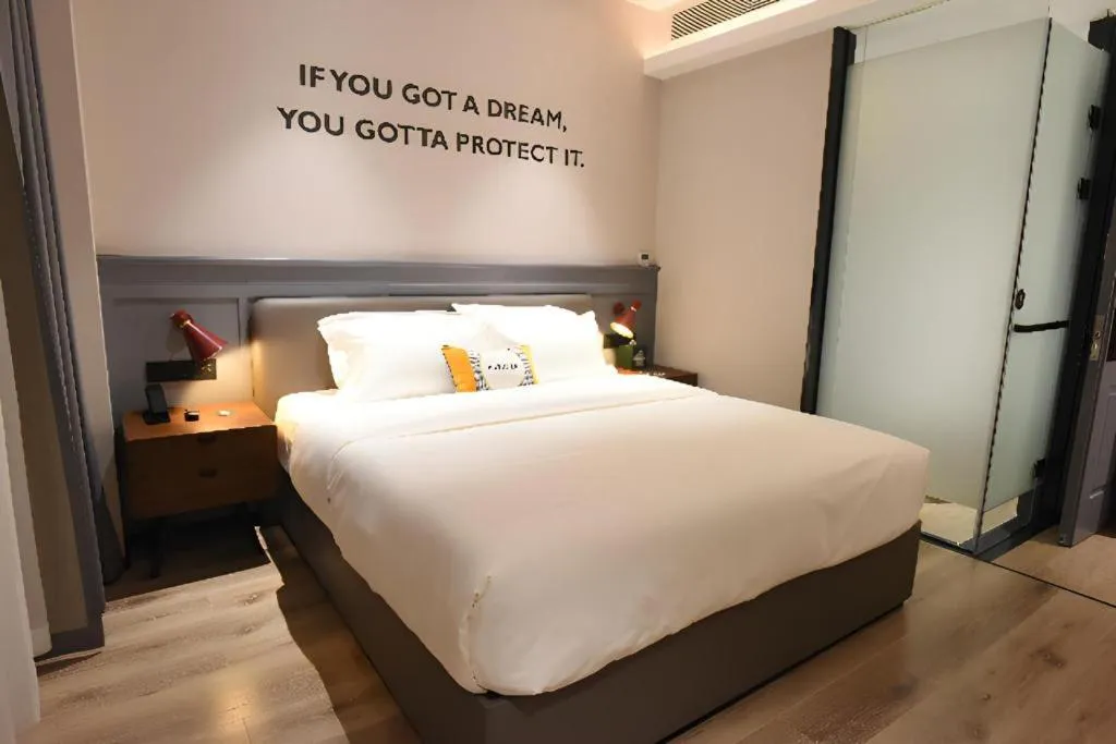 Bed in Premier City Comfort Hotel Hechi Luocheng Central Plaza