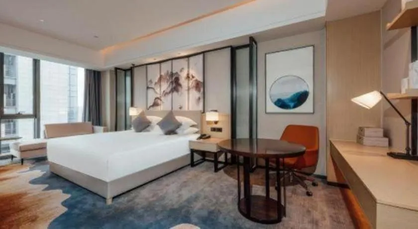 Bed in New Century Grand Hotel Ningbo Zhongdu