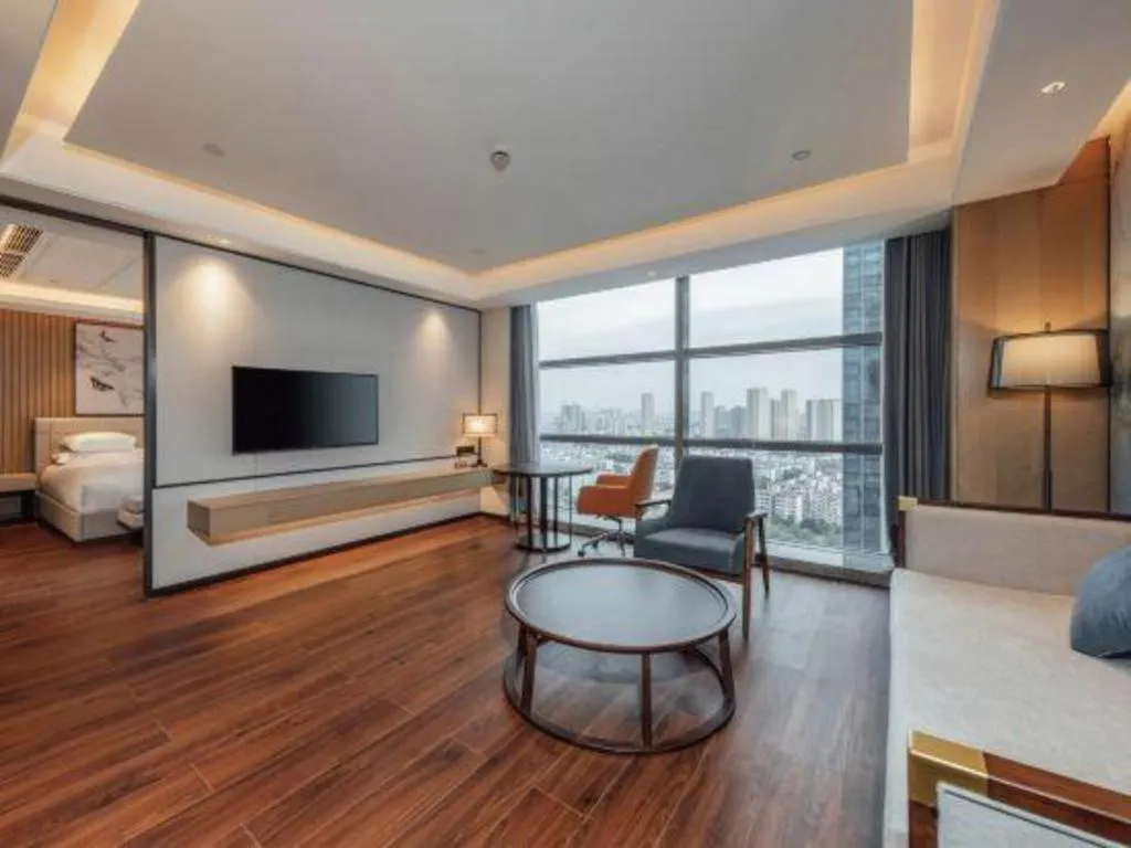 Bed in New Century Grand Hotel Ningbo Zhongdu