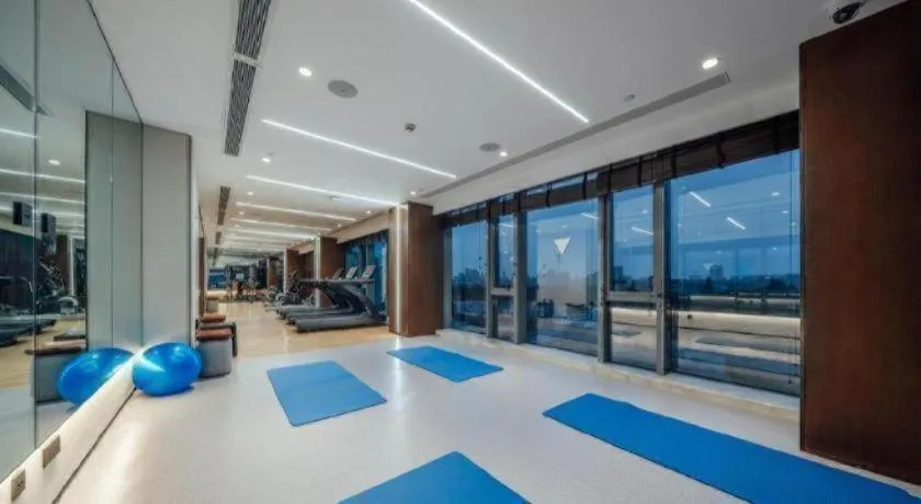 Bed in New Century Grand Hotel Ningbo Zhongdu