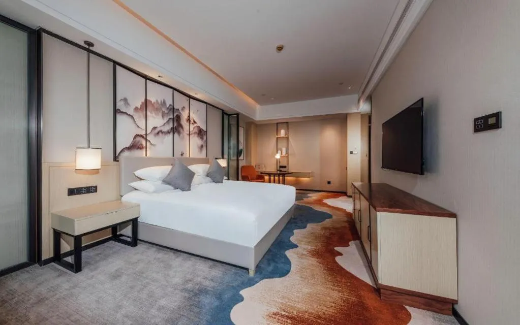 Bed in New Century Grand Hotel Ningbo Zhongdu