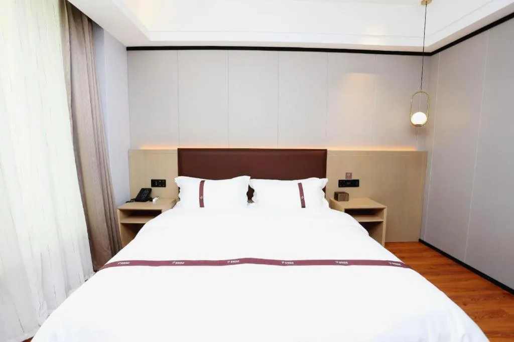 Bed in Gya Hotel Beijing Shunyi Yanjing Bridge