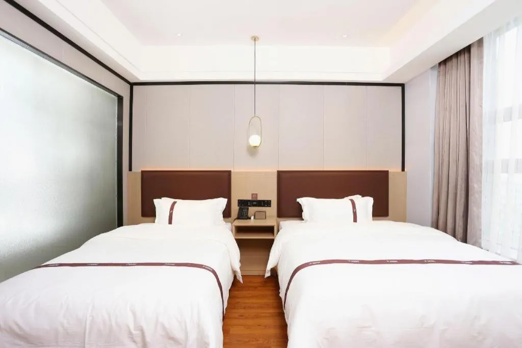 Bed in Gya Hotel Beijing Shunyi Yanjing Bridge