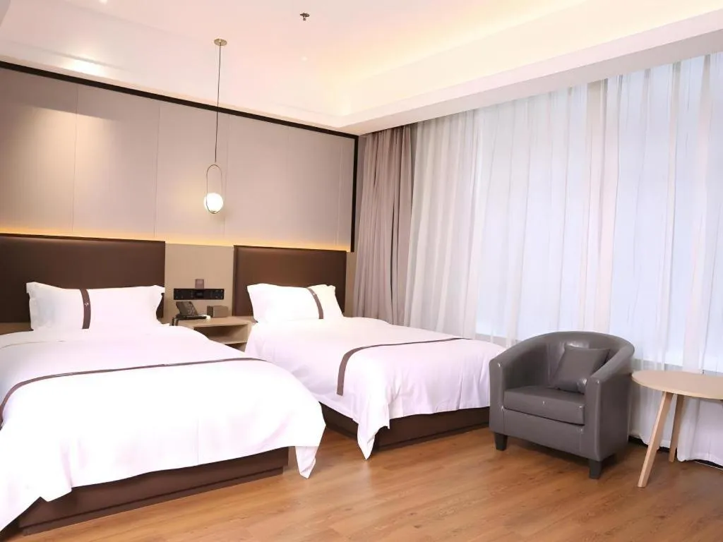 Bed in Gya Hotel Beijing Shunyi Yanjing Bridge