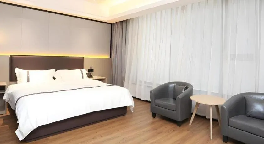 Bed in Gya Hotel Beijing Shunyi Yanjing Bridge