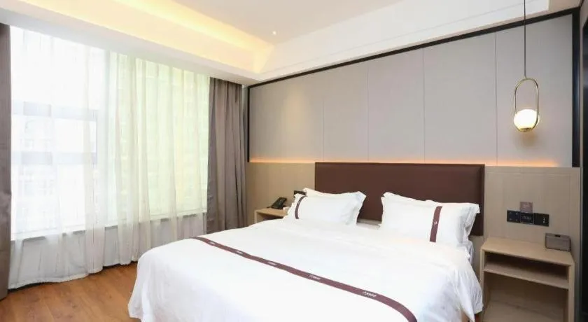 Bed in Gya Hotel Beijing Shunyi Yanjing Bridge