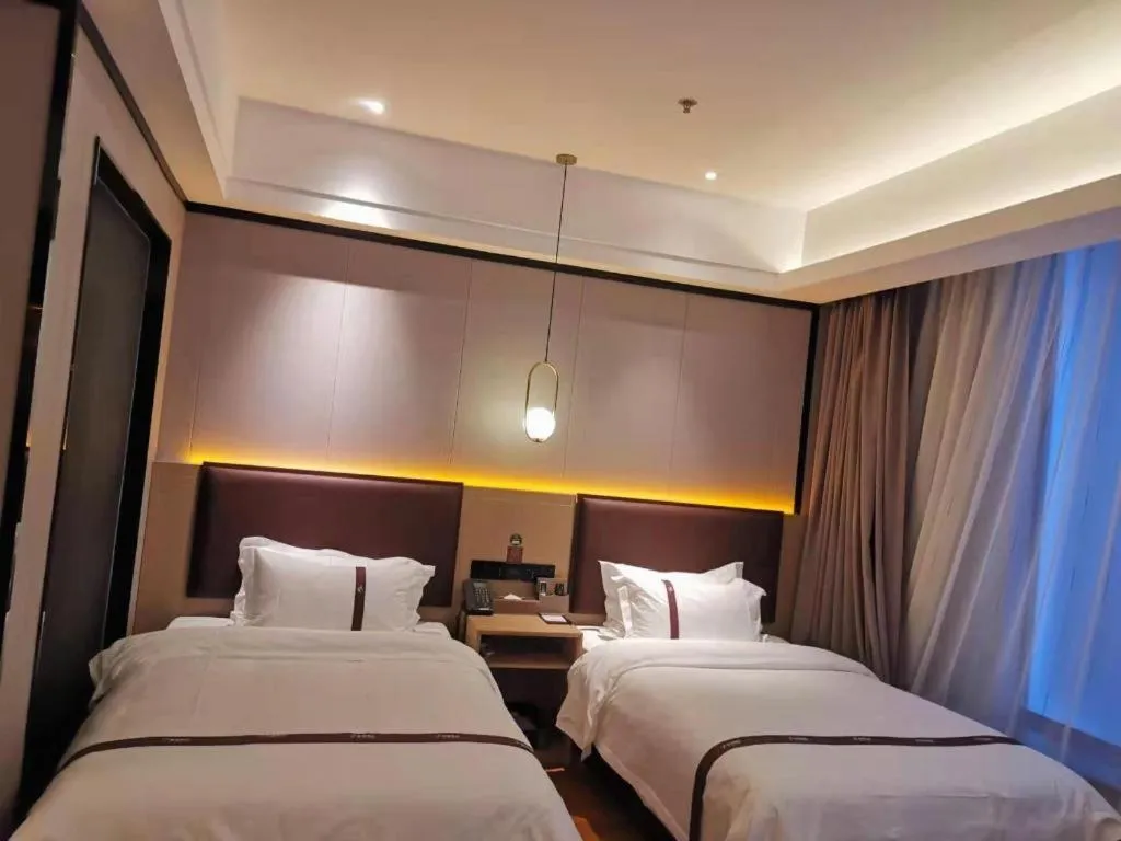 Bed in Gya Hotel Beijing Shunyi Yanjing Bridge