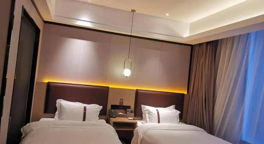 Bed in Gya Hotel Beijing Shunyi Yanjing Bridge