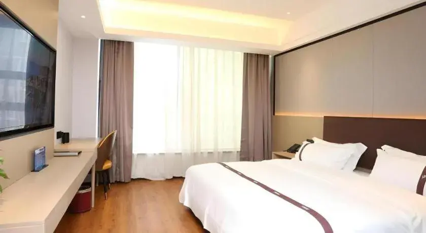 Bed in Gya Hotel Beijing Shunyi Yanjing Bridge Bed in Gya Hotel Beijing Shunyi Yanjing Bridge