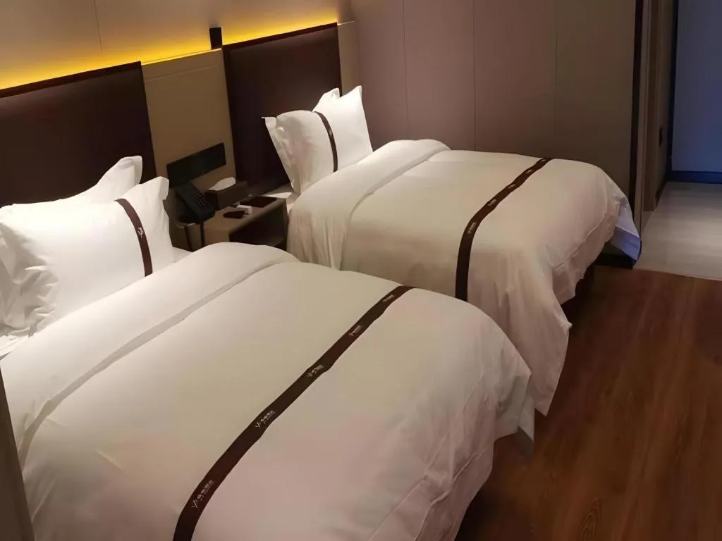 Bed in Gya Hotel Beijing Shunyi Yanjing Bridge