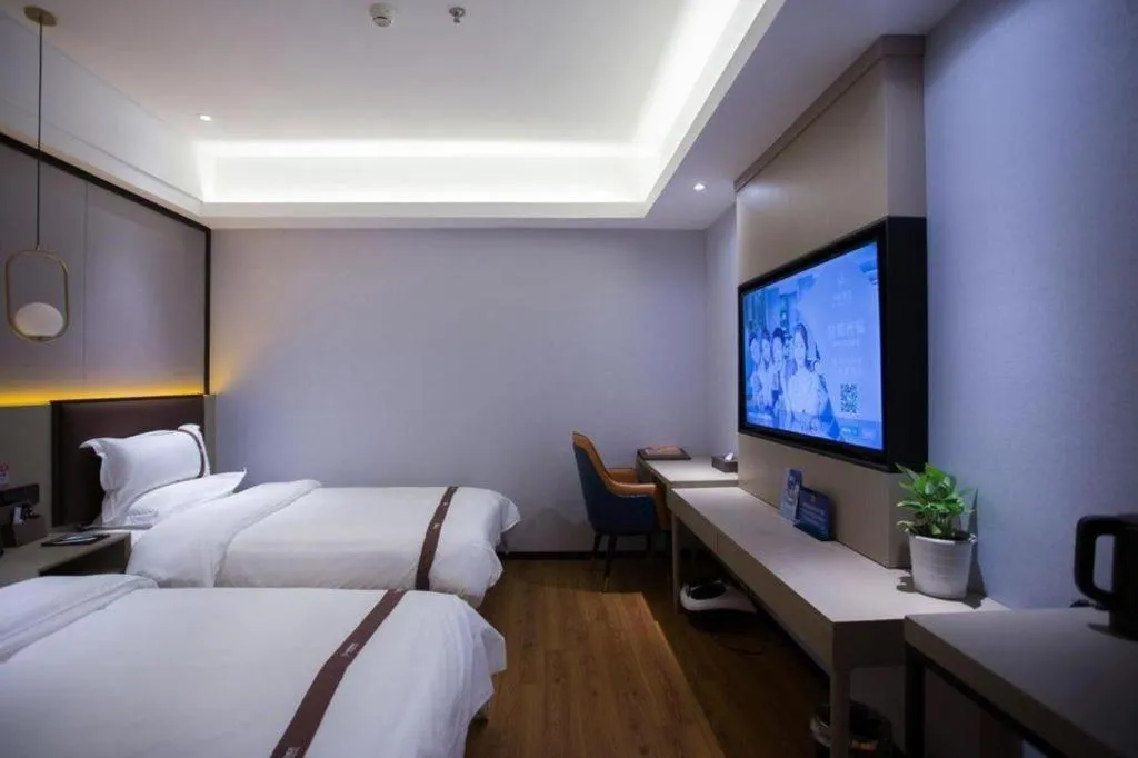 Bed in Gya Hotel Beijing Shunyi Yanjing Bridge