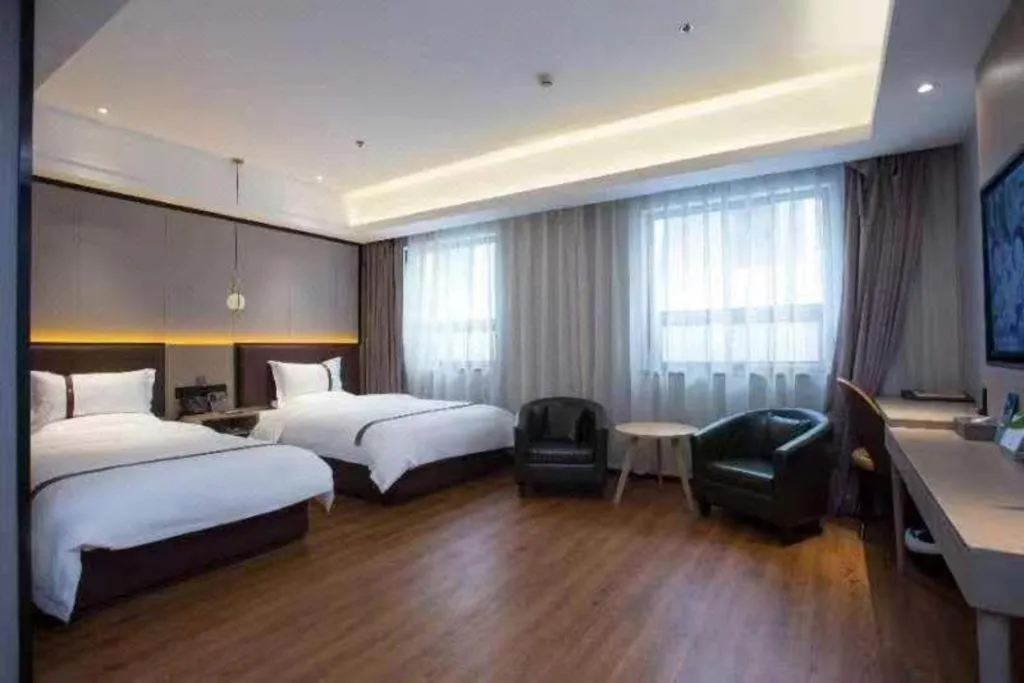 Bed in Gya Hotel Beijing Shunyi Yanjing Bridge