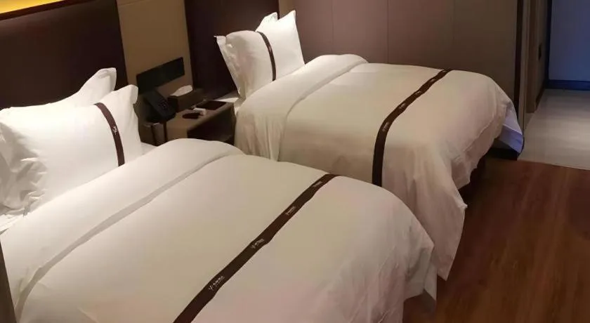 Bed in Gya Hotel Beijing Shunyi Yanjing Bridge