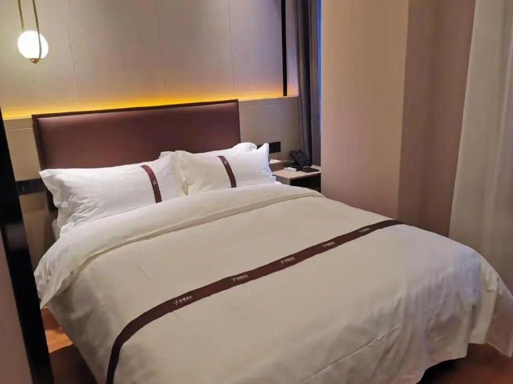 Bed in Gya Hotel Beijing Shunyi Yanjing Bridge