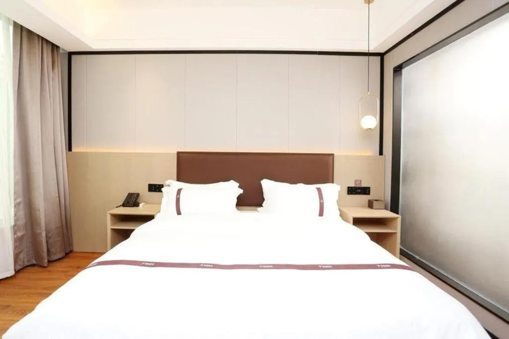 Bed in Gya Hotel Beijing Shunyi Yanjing Bridge
