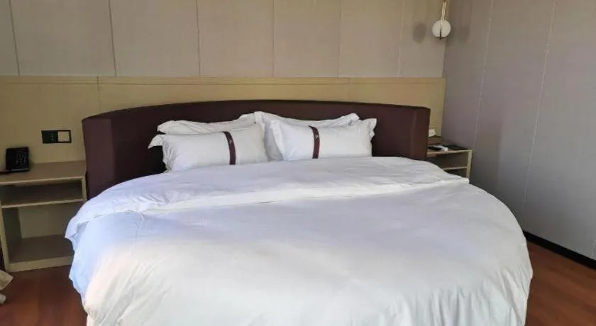 Bed in Gya Hotel Beijing Shunyi Yanjing Bridge