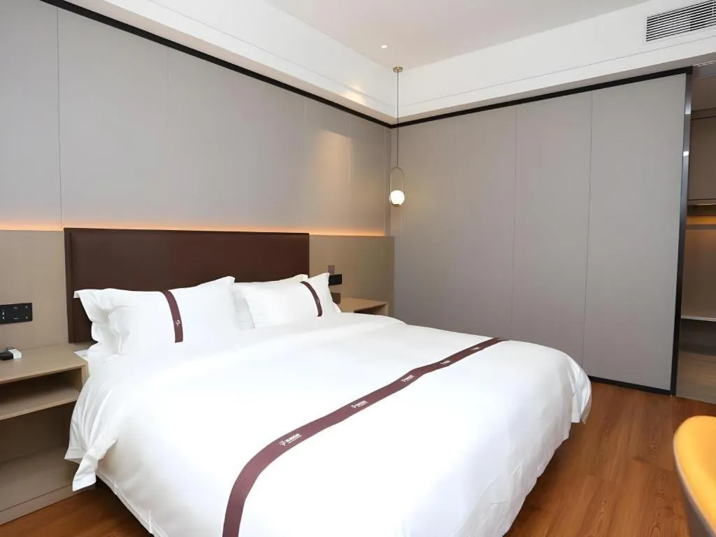 Bed in Gya Hotel Beijing Shunyi Yanjing Bridge
