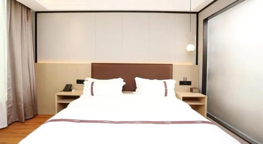Bed in Gya Hotel Beijing Shunyi Yanjing Bridge