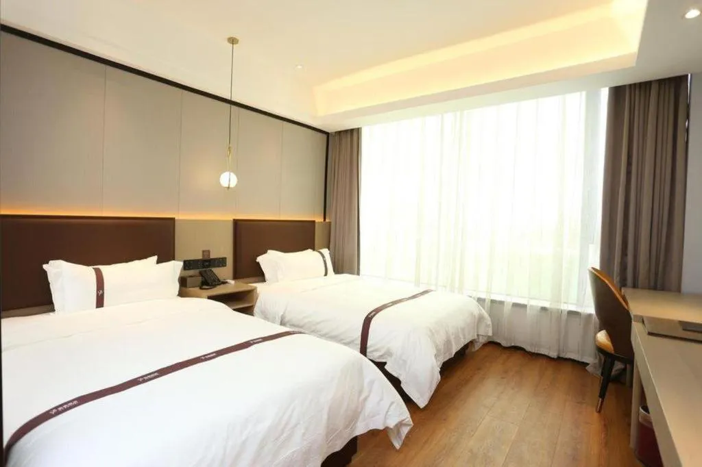 Bed in Gya Hotel Beijing Shunyi Yanjing Bridge