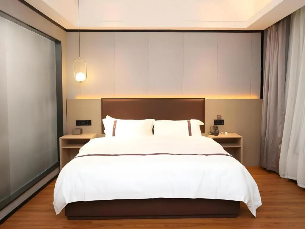 Bed in Gya Hotel Beijing Shunyi Yanjing Bridge