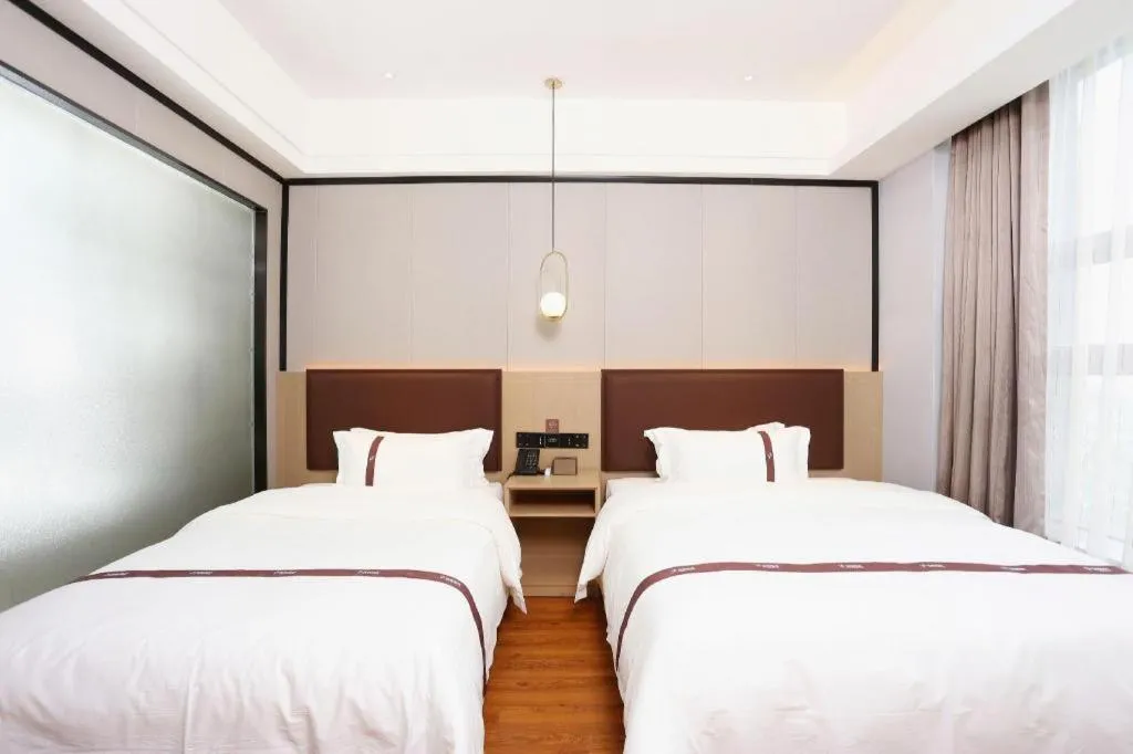 Bed in Gya Hotel Beijing Shunyi Yanjing Bridge