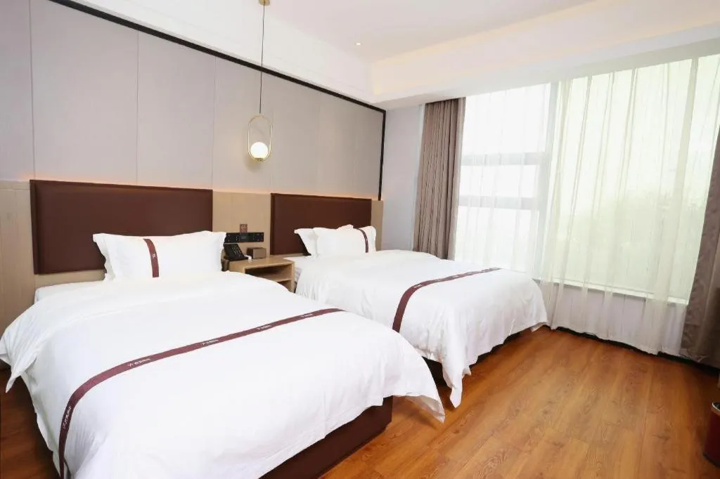 Bed in Gya Hotel Beijing Shunyi Yanjing Bridge