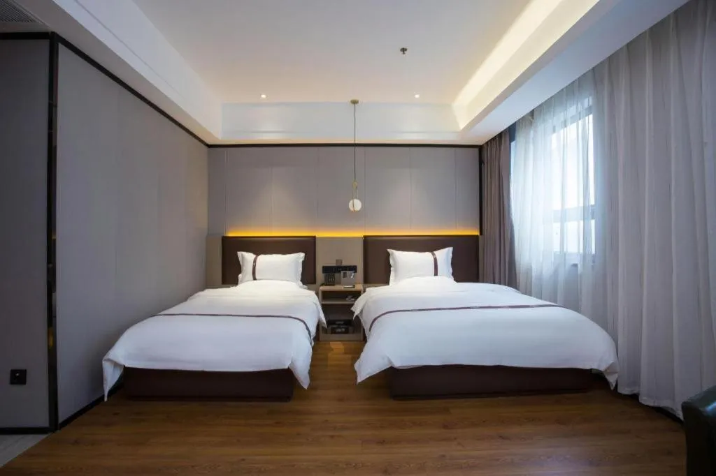 Bed in Gya Hotel Beijing Shunyi Yanjing Bridge