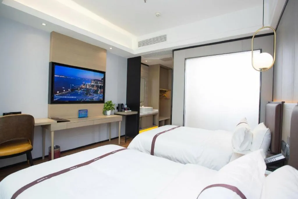 Bed in Gya Hotel Beijing Shunyi Yanjing Bridge