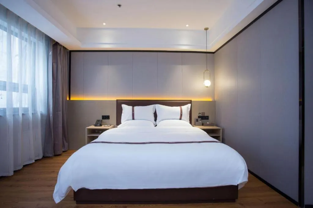 Bed in Gya Hotel Beijing Shunyi Yanjing Bridge