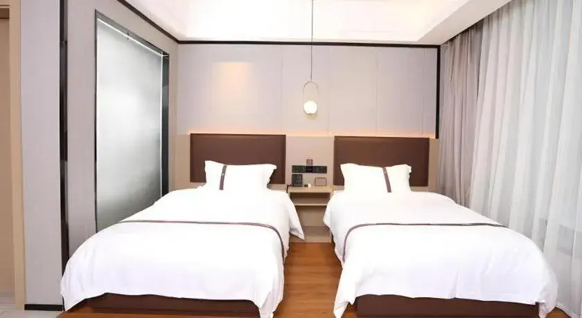 Bed in Gya Hotel Beijing Shunyi Yanjing Bridge Bed in Gya Hotel Beijing Shunyi Yanjing Bridge