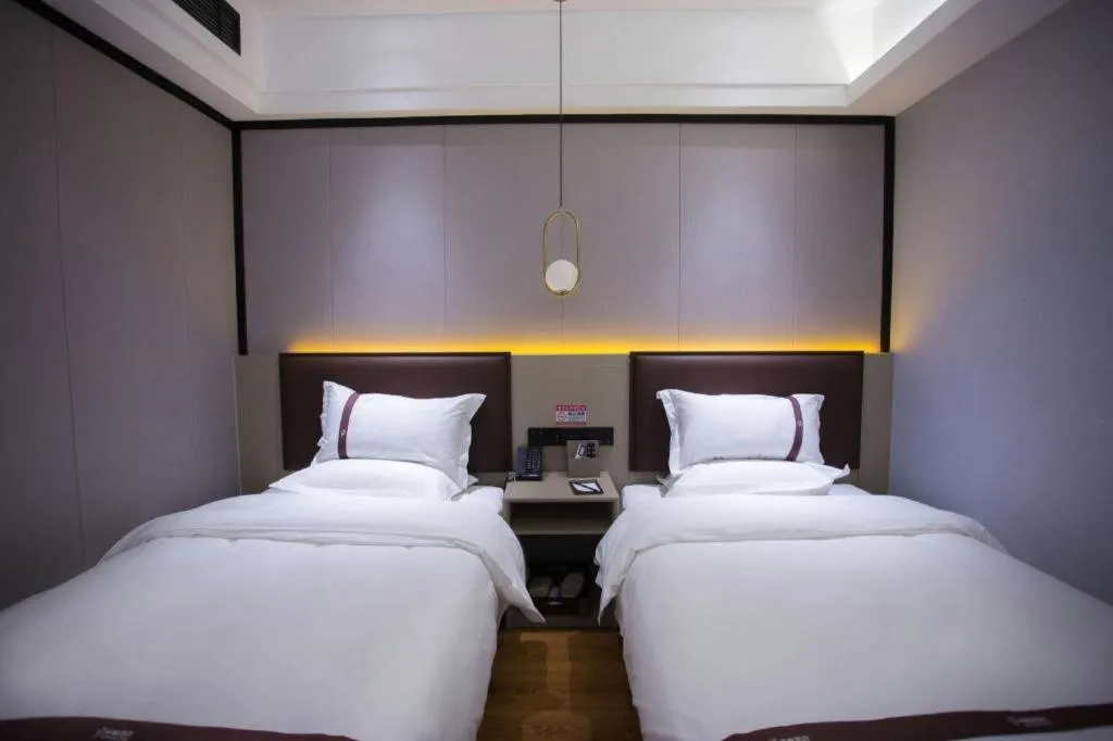 Bed in Gya Hotel Beijing Shunyi Yanjing Bridge