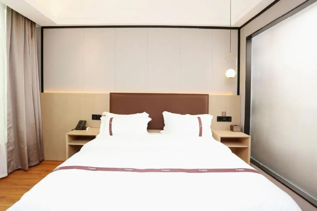 Bed in Gya Hotel Beijing Shunyi Yanjing Bridge