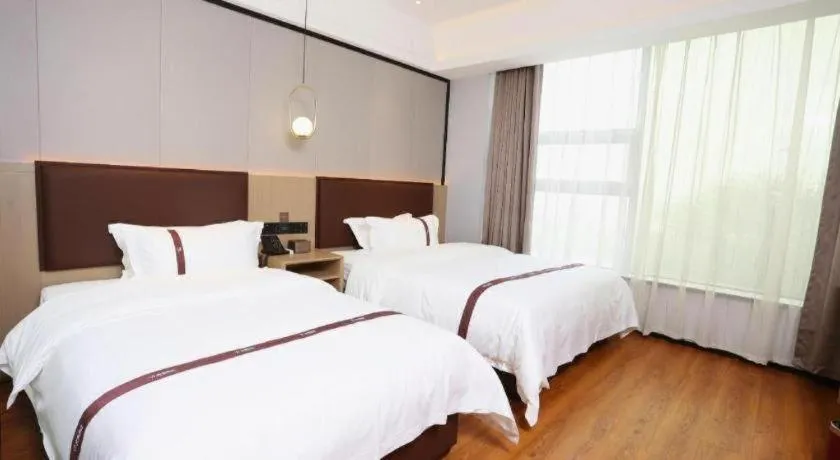 Bed in Gya Hotel Beijing Shunyi Yanjing Bridge