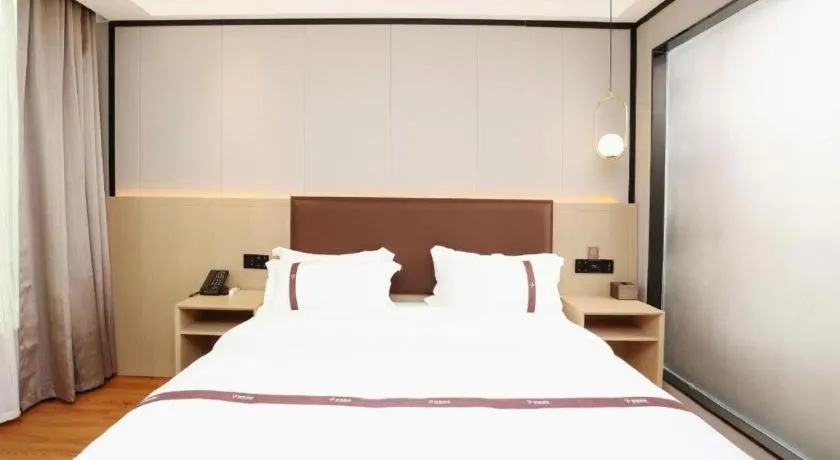 Bed in Gya Hotel Beijing Shunyi Yanjing Bridge