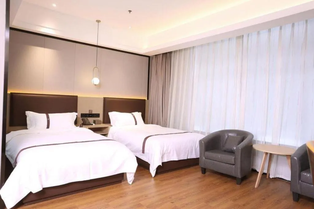 Bed in Gya Hotel Beijing Shunyi Yanjing Bridge