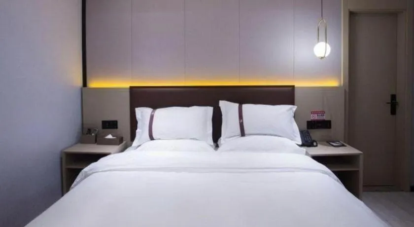 Bed in Gya Hotel Beijing Shunyi Yanjing Bridge