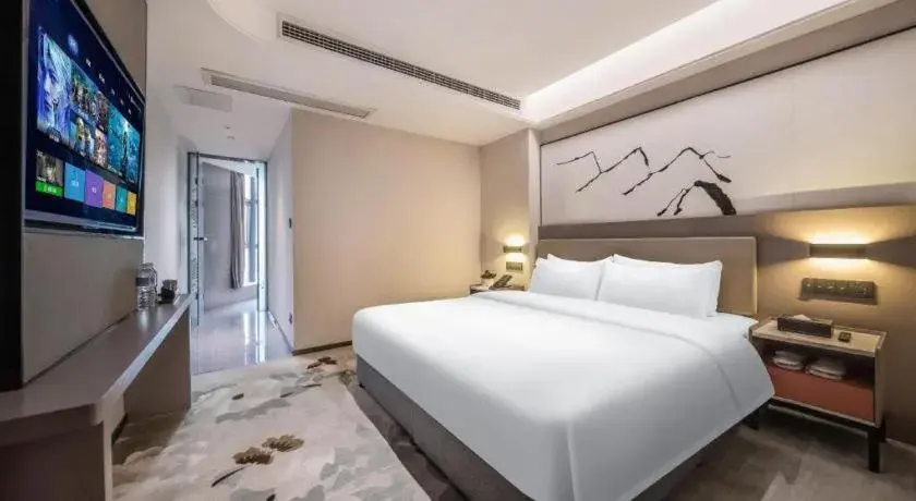 Bed in GreenTree Eastern Chongqing Yangjiaping Pedestrian Street Mixc Hotel Bed in GreenTree Eastern Chongqing Yangjiaping Pedestrian Street Mixc Hotel