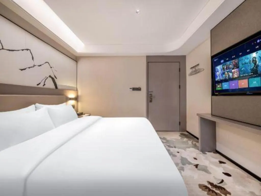Bed in GreenTree Eastern Chongqing Yangjiaping Pedestrian Street Mixc Hotel