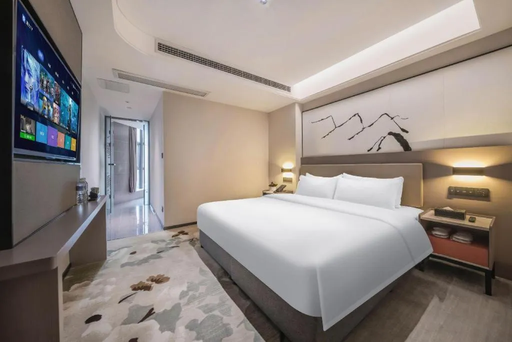 Bed in GreenTree Eastern Chongqing Yangjiaping Pedestrian Street Mixc Hotel