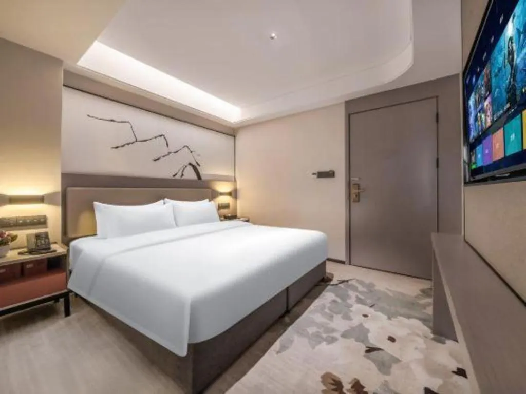 Bed in GreenTree Eastern Chongqing Yangjiaping Pedestrian Street Mixc Hotel