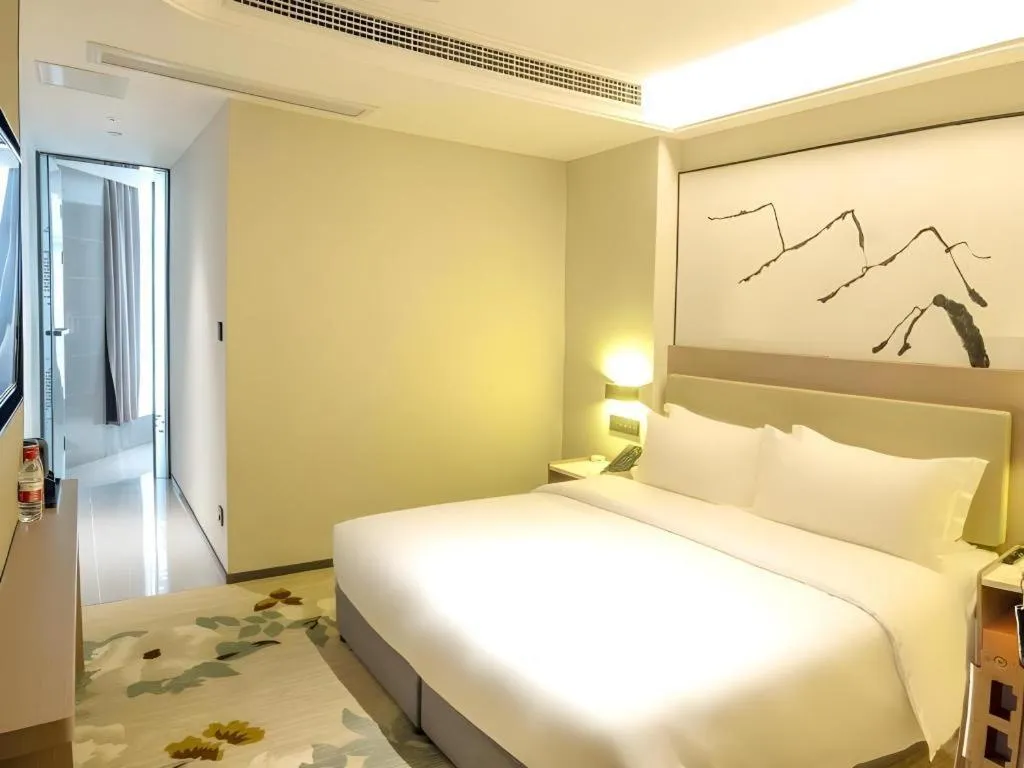 Bed in GreenTree Eastern Chongqing Yangjiaping Pedestrian Street Mixc Hotel